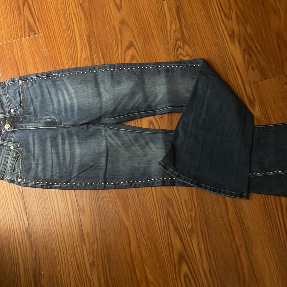 Long flared jeans with silver dome studs